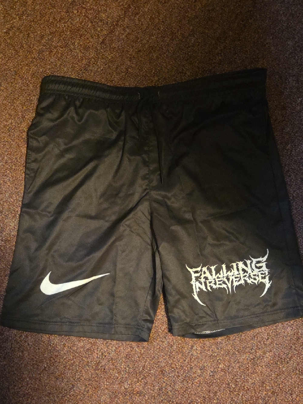Nike Black Athletic Shorts with White Swoosh and Band Logo